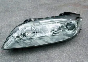 Faro Izquierdo Electrico (Magneti Marelli) para Mazda 6 2002