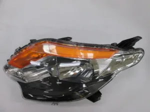 Faro Izquierdo (Regulacion Manual/Electrica) Interior Negro (H4) para Mitsubishi L200 PICK-UP 2015