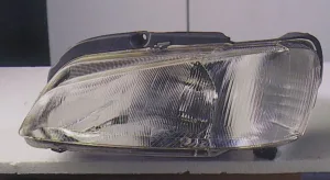 Faro Izquierdo (Regulacion Manual/Electrica) para Peugeot 106 1996